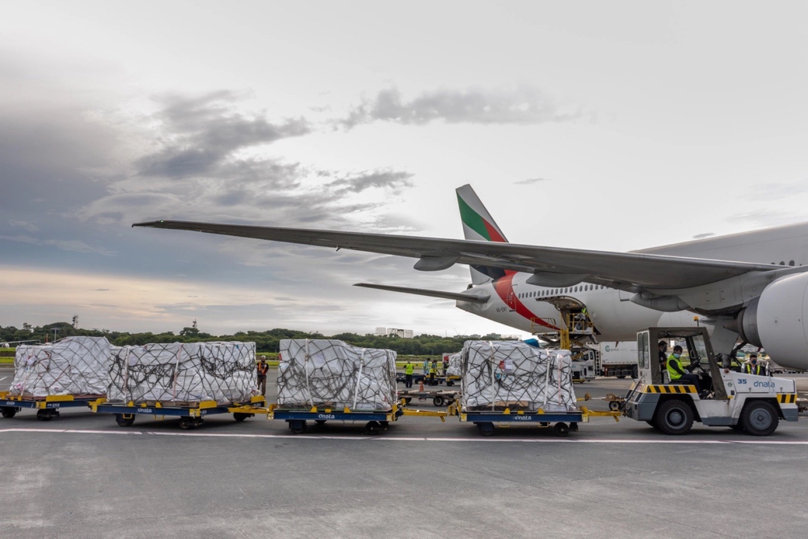 Air-cargo pallets being loaded onto a wide-body freighter