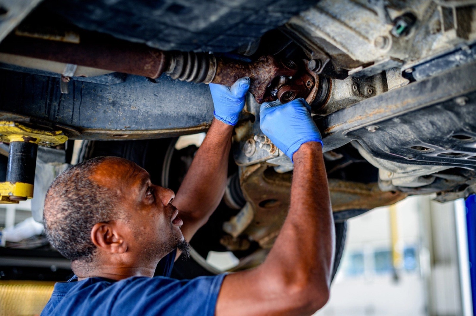 Diesel mechanic working on a commercial truck
